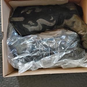 Snake boots with leather exterior